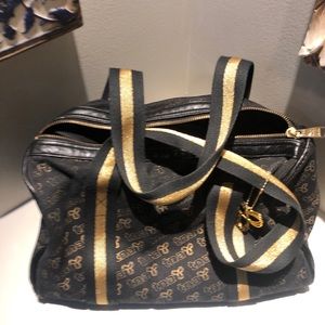 - TNA bag Black and Gold